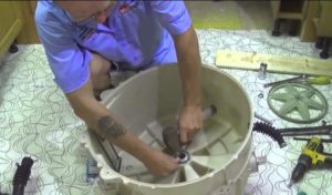 Removing the washing machine bearing