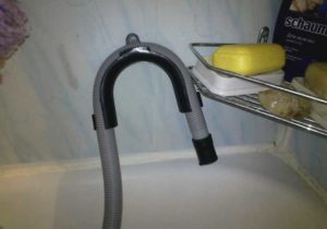 Draining the washing machine into the bathroom