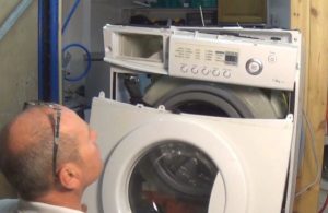 Removing the front part of the washing machine
