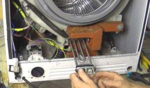 Kütteelemendi eemaldamine ja vahetamine pesumasinast