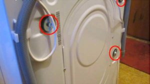 Where are the shipping bolts on a washing machine?