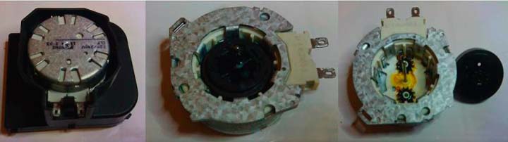 We remove the gears and motor from the washing machine's programmer.