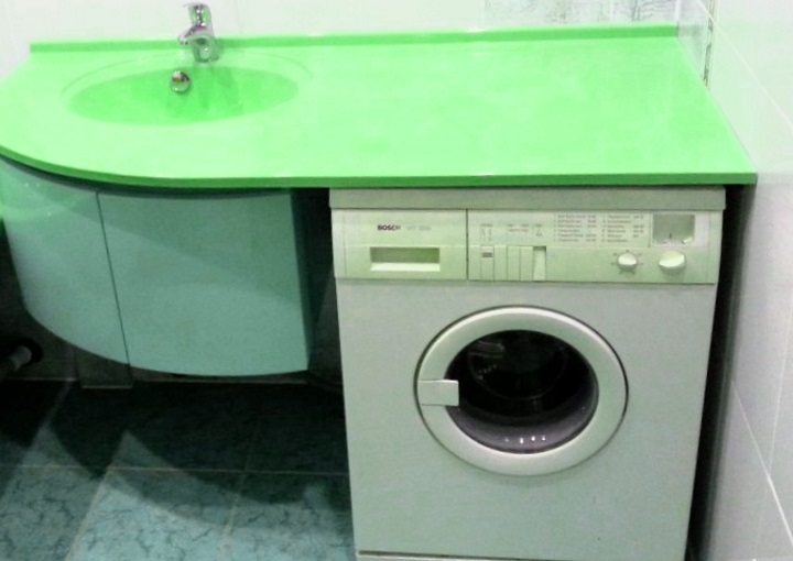 Green countertop above the washing machine