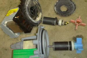 Disassembling and cleaning the drain pump