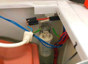 Surge protector in a washing machine