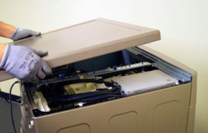 Remove the top cover of the washing machine