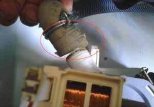 Remove the drain hose from the washing machine