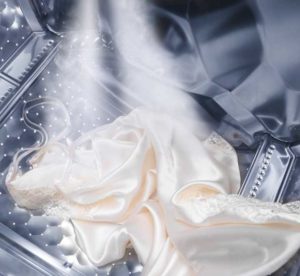 Washing clothes with steam