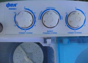 Semi-automatic washing machine timer on the panel