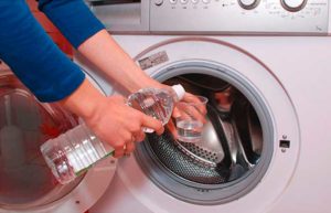 Cleaning a washing machine with acetic acid